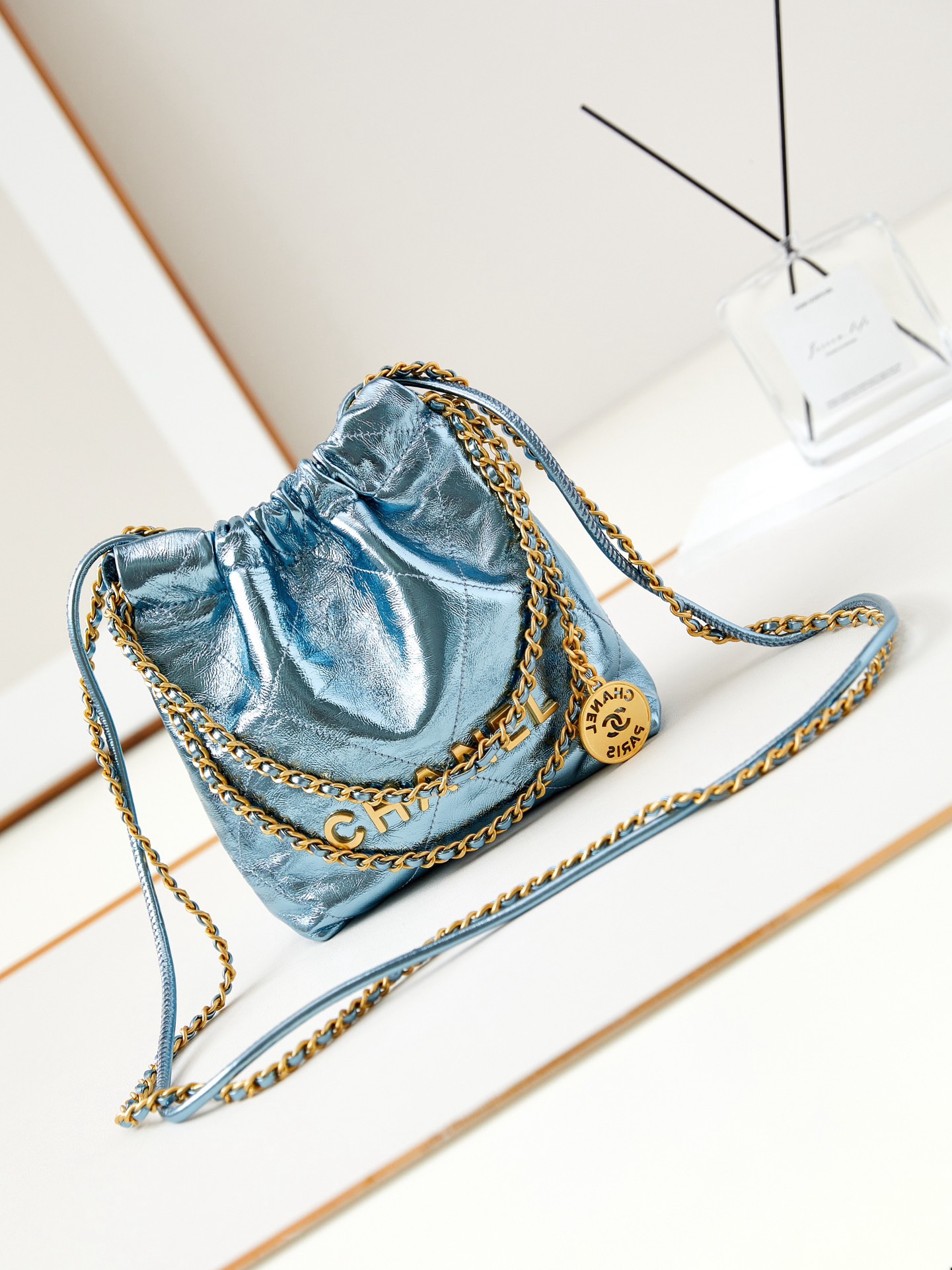 CHANEL 22 MINI HANDBAG AS3980 Pearlescent blue